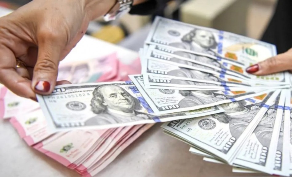 Rupiah Berakhir di Zona Merah, BI Tahan Suku Bunga dan Gejolak Timur Tengah Bayangi Pasar