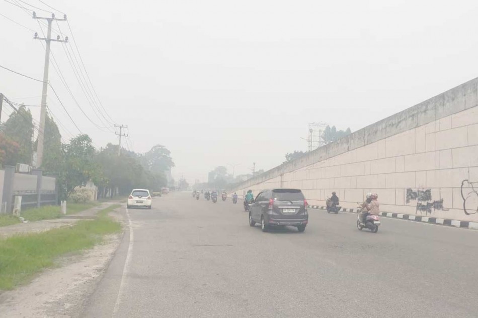 Sumatera Dikepung 4.806 Hotspot, Asap Selimuti Riau, Lindungi Pernafasan