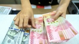 Ancaman Presiden Trump Pada Iran Bikin Rupiah Gemetar, Terpuruk Jadi Rp17.035  Per-Dolar AS Petang Ini