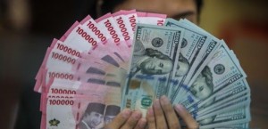 Sempat Tembus Rp18.100 per Dolar AS, Rupiah Ditutup Menguat Jelang Keputusan The Fed